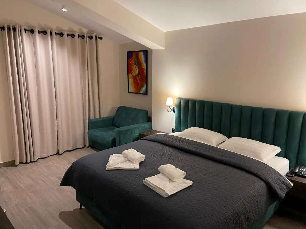 Family Room with Balcony — Venis Hotel